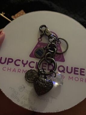Kathy Van Zeeland Gunmetal Logo Disc Charm with Pink Accent